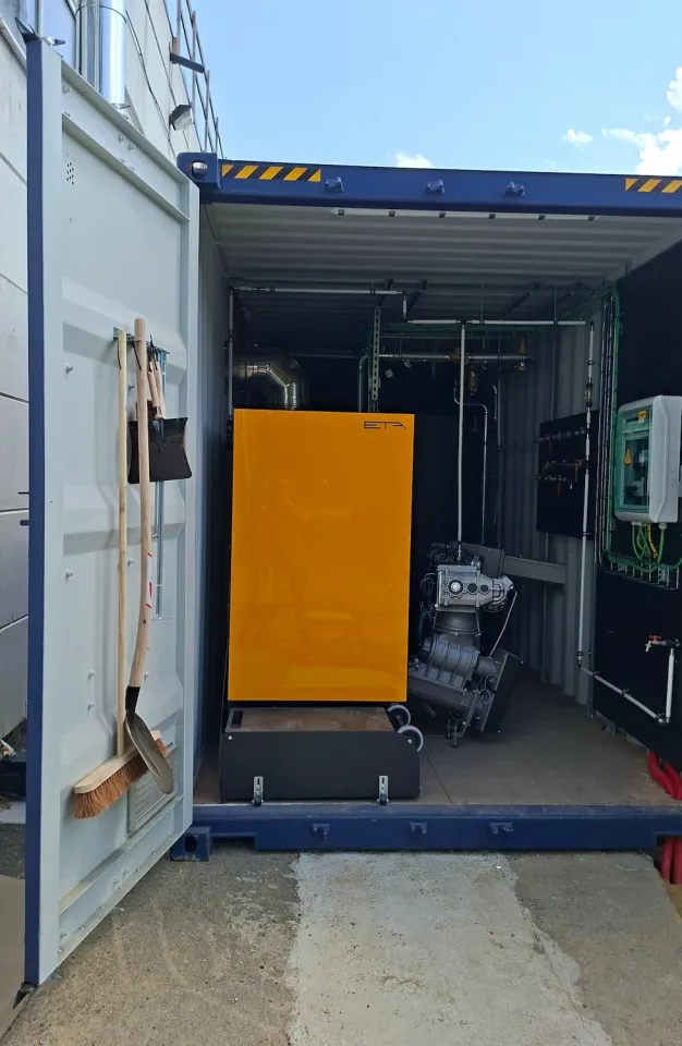 Oxfam Wavre Chaudière biomasse ETA dans un container maritime